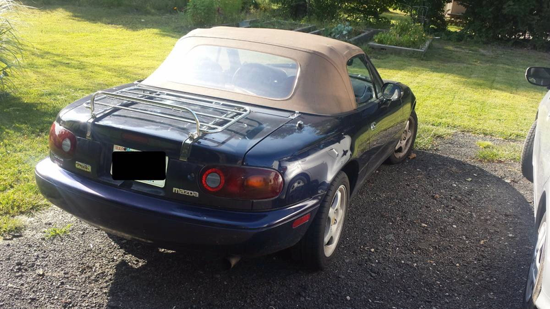 Illustration for article titled At $2,400, Could This 1996 Mazda MX5 Miata Be The Answer?
